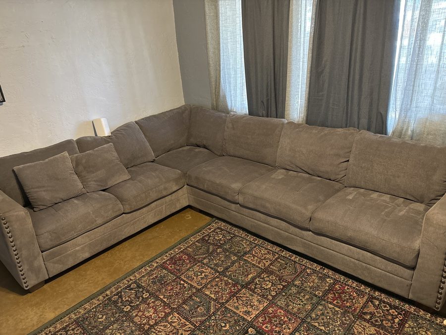 Gray sectional couch cleaned by Fusion Carpet Cleaning